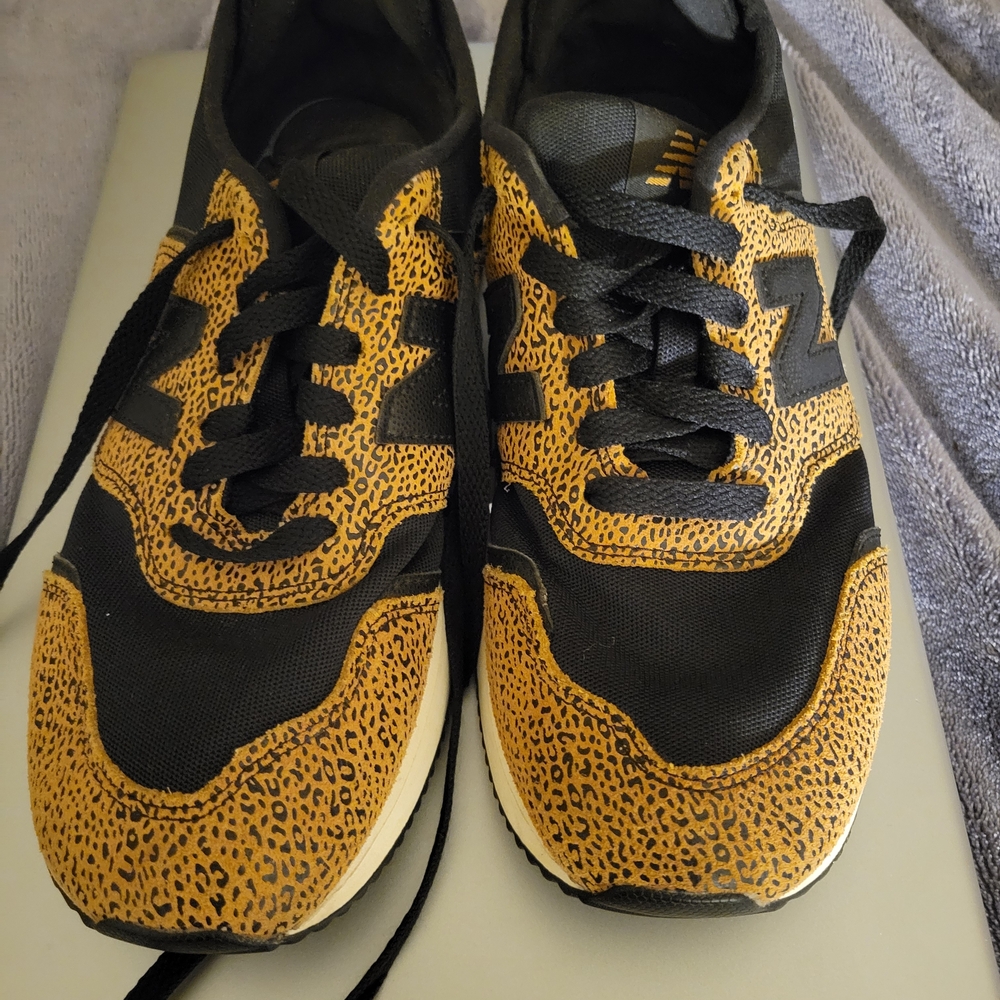 New Balance Black and Gold Athletic Shoes
